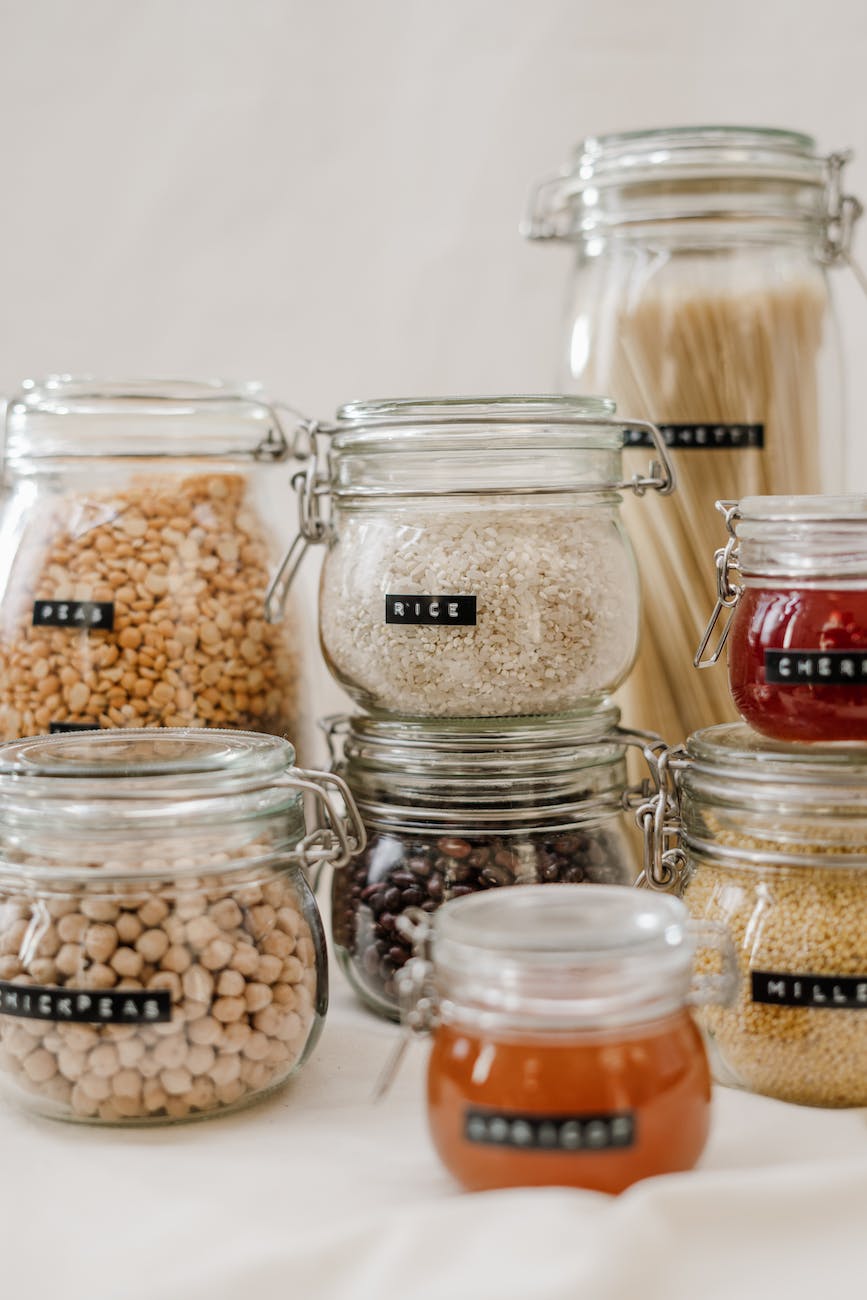 clear glass jars filled with cereals