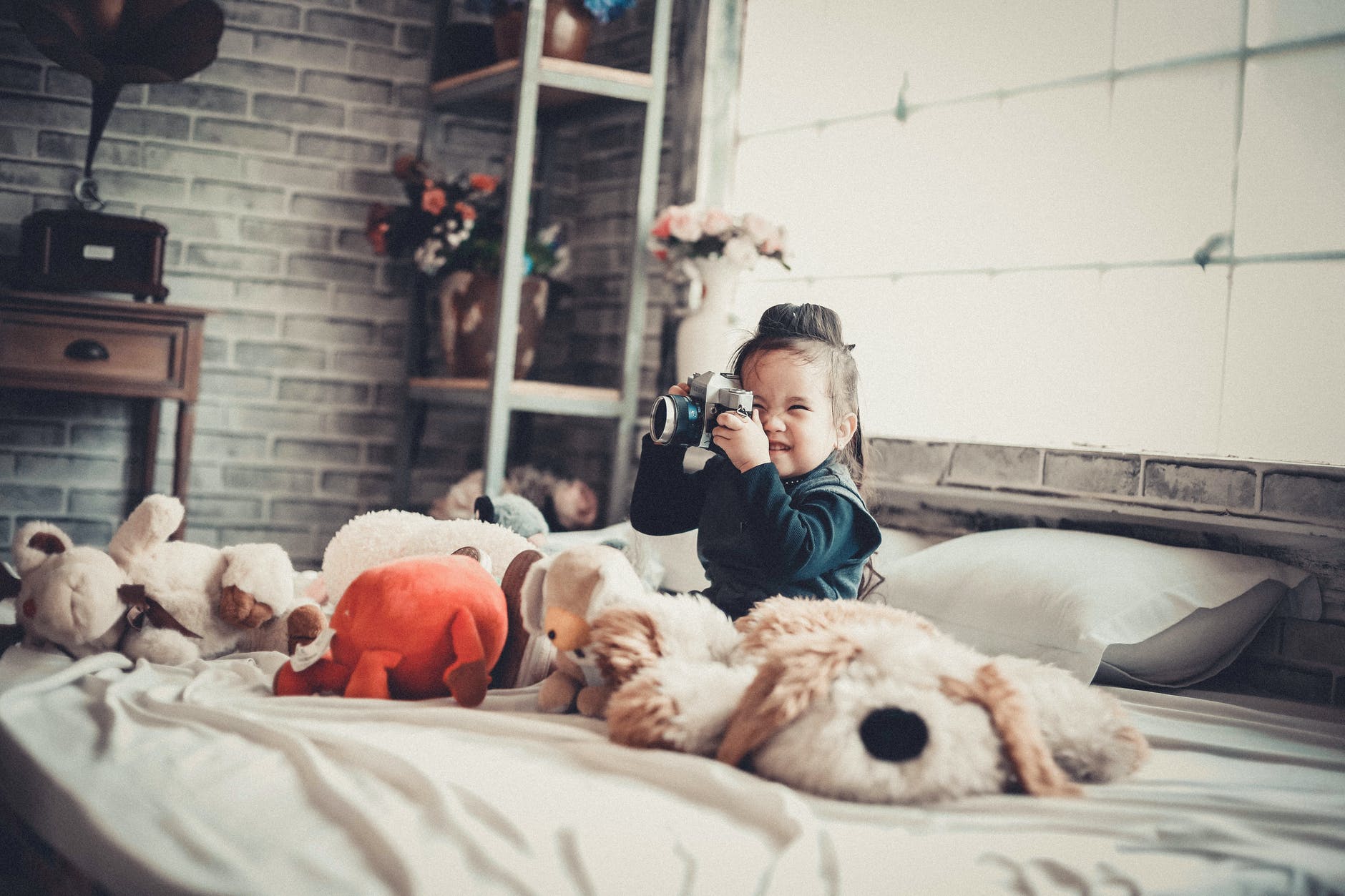 photo of a girl playing with the camera